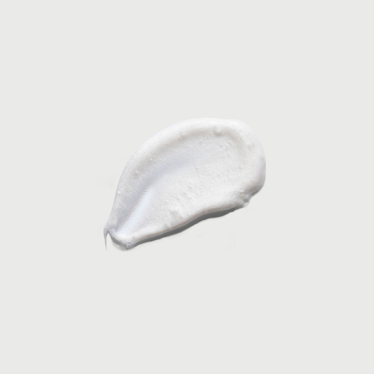 the-smoother-glycolic-acid-exfoliating-body-wash-w9 NATR-40002-Swatch-The-Smoother-Glycolic-Acid-Exfoliating-Body-Wash-bonebkgd.jpg
