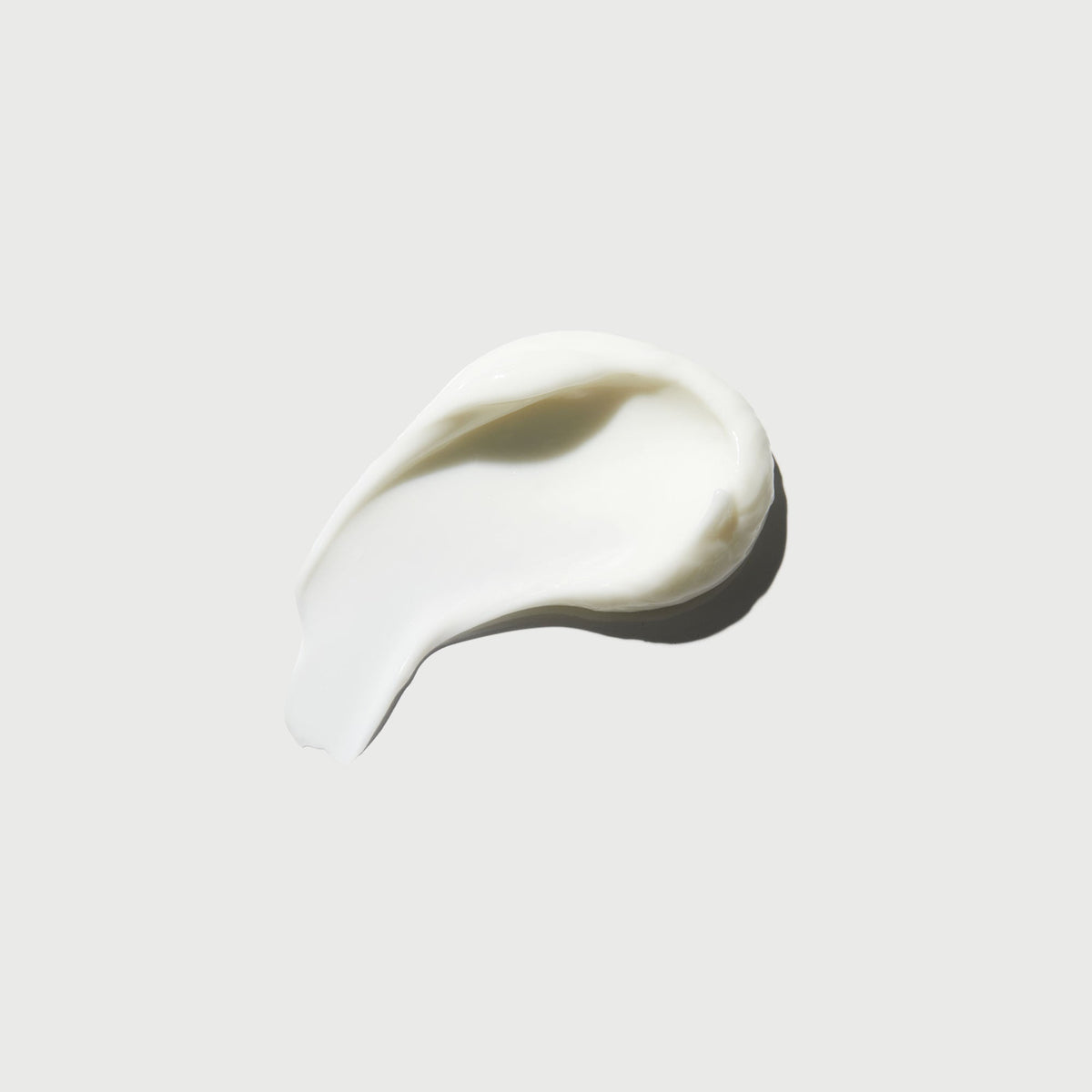 the-smoother-glycolic-acid-body-lotion-i9 NATR-40014-Swatch-The-Smoother-Glycolic-Acid-Body-Lotion-bonebkgd.jpg