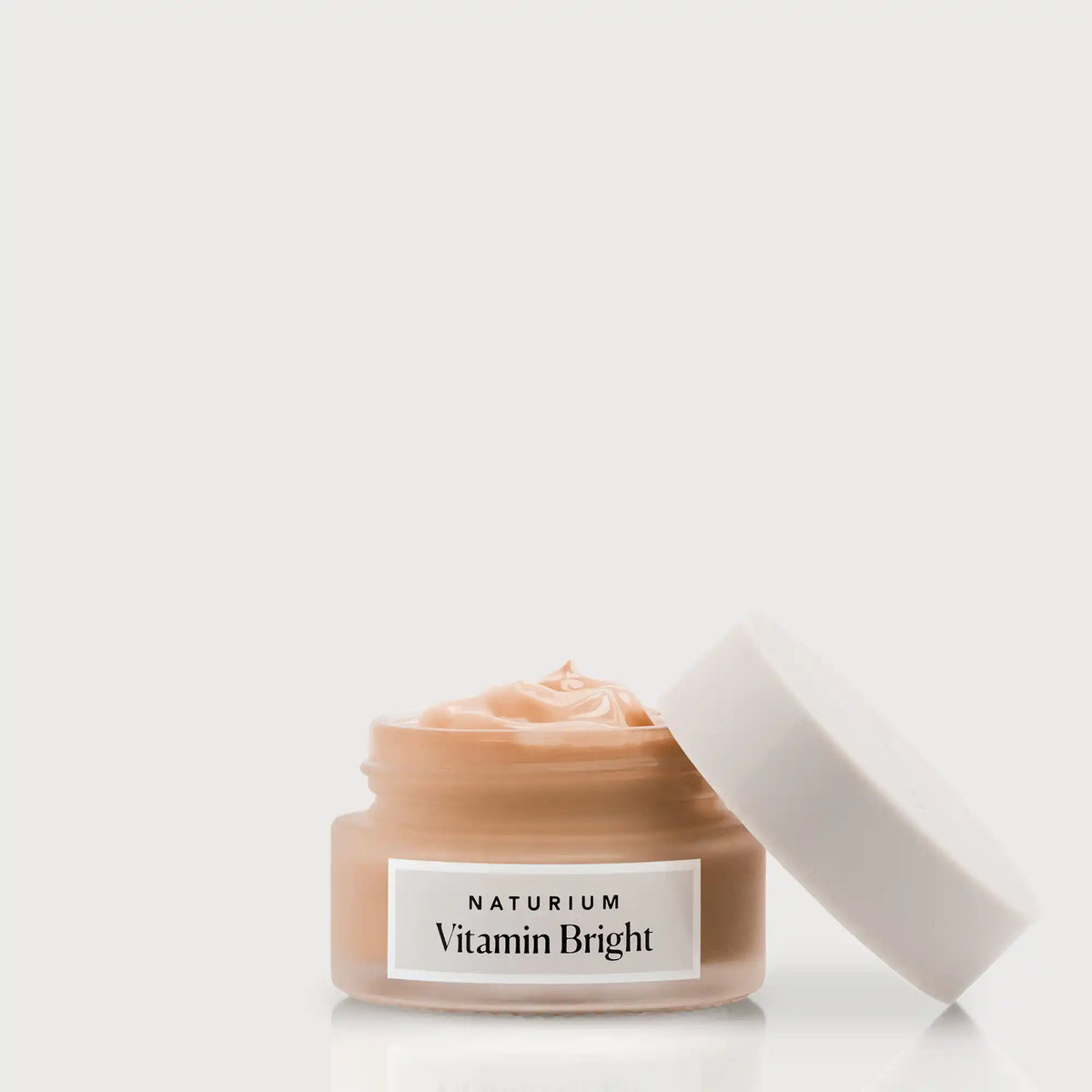 vitamin-bright-illuminating-eye-cream-l3 NATR-VitaminBright_DEEP_Primary_front_openjar_bone.webp
